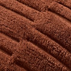 a close up view of a brown rug