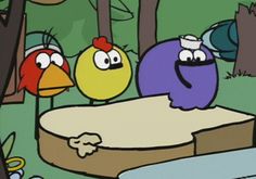 the angry birds are standing around in the woods