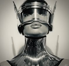 a woman's face is covered in metal parts and has her head tilted to the side