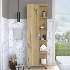 a bathroom with a wooden cabinet next to a toilet