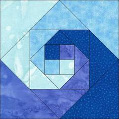 a blue and white quilt with an abstract design on the front, in shades of blue