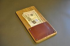 a wallet with money sticking out of it