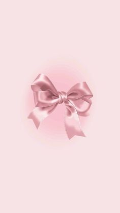 a pink background with a large bow on it