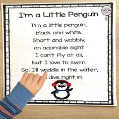 a penguin poem with a hand pointing at it and the words i'm a little penguin