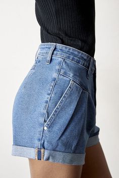 High Rise Roll Up Denim Shorts- 68% Cotton, 28% Polyester, 2% Rayon, 2% Spandex- Stretch Denim- High Waist- Roll Up- Imported, Designed In USASize S- Waist 26 1/2"- Hip 40 1/2"- Front Rise 12 1/2"- Leg Opening 24"- Inseam 3"Model wears size S, height 5'8" Style: Casual Print / Pattern: Medium Wash Denim Silhouette: Pleated Front Fit: Super High Rise Embellishment: Trouser front pocket Neck Line: N/A Sleeve: N/A Length: Short Closure: Button Closure Lining: No Fabric Contents: 68% Cotton, 28% Pol Cardigan Sweater Coat, High Rise Denim Shorts, Athleisure Wear, Pleated Shorts, Denim Short, High Rise Shorts, High Rise Denim, High Waisted Denim, Sheer Fabrics