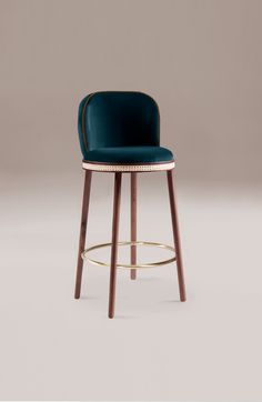 a blue stool with wooden legs on a white background