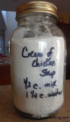 a jar filled with white stuff sitting on top of a table