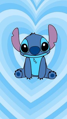 a cartoon character with big eyes sitting in the middle of a heart shaped pattern on a blue background