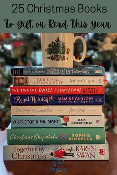 a stack of books with the title 25 christmas books to get on read this year