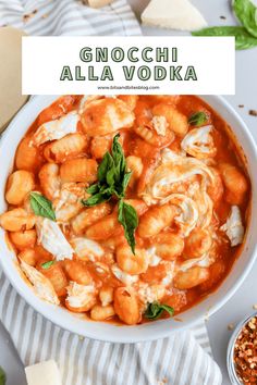 gnocchi alla vodka in a white bowl with basil garnish