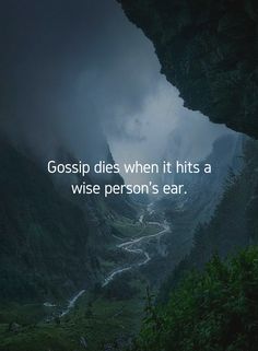 a quote on the side of a mountain saying, gossip dies when it hits a wise person's ear