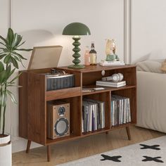 Vinyl Record Rack and Storage: Features an elegant multi-purpose design that can easily blend into different environments. Its classic look and color complement a variety of home styles. Not only can it be used as a vinyl storage cabinet, the mid-century modern turntable rack with record storage can also be used as a decorative piece or small piece of furniture to add a unique touch to your room. Color: Walnut | George Oliver Audio Rack, Record Player Stand w / Charging Station & Usb Ports 29.52 Vinyl Record Rack, Media Shelves, Record Rack, Media Shelf, Audio Room