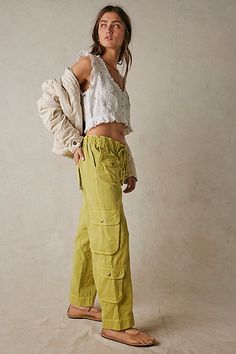 The coolest way to cargo, these timeless pants are featured in a low-rise, slouchy straight silhouette with utility-style pockets throughout and smocked waist for ease. * Zip fly and button closure * Drawstring waist feature * Oversized pockets throughout * Ankle-length | Tahiti Cargo Pants by Free People in Green, Size: L Utility Outfit, Alt Summer Outfits, Summer Outfits Y2k, Outfits Athletic, Y2k Summer Outfits, Summer Outfits Women Over 40, Plus Size Summer Outfits, Modest Summer Outfits, Cargo Pants Outfit