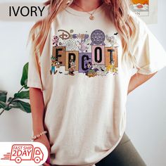 a woman wearing a t - shirt with the word froot on it in front of her