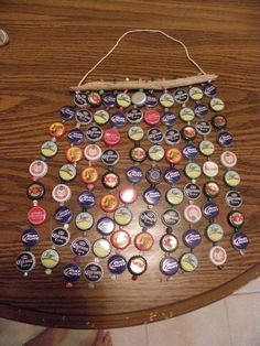 a wooden table topped with lots of bottle caps