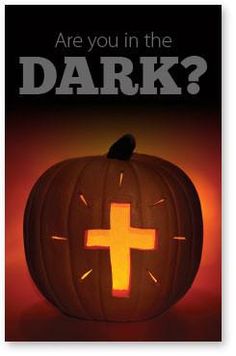 a pumpkin with a cross carved into it and the words are you in the dark?