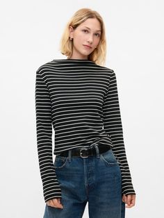 Soft cotton-modal blend ribbed knit T-shirt.  Funnel neck.  Long sleeves.  Fit: Stretch-to-Fit.  Slim & stretchy that forms to your shape.  Hits at the hip.  Models wearing Gap Twelfth Night, Brand Collaboration, Black And Beige, Striped T Shirt, Knitted Tshirt, Funnel Neck, Funnel, Neck T Shirt, Gap