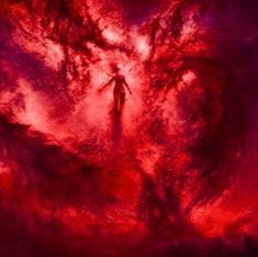 a person standing in the middle of a red and purple sky