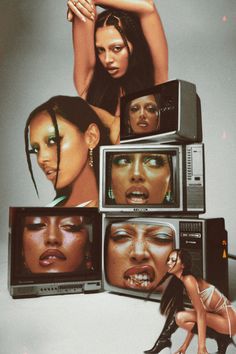 the woman is standing in front of several televisions with different faces on them,