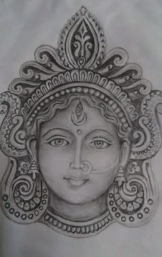 a pencil drawing of a woman's face with an ornate headdress on it