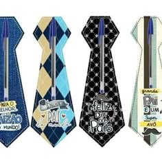 three ties with different designs on them, one is blue and the other is black