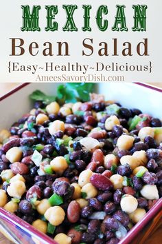 mexican bean salad in a red bowl on a wooden table with the title above it