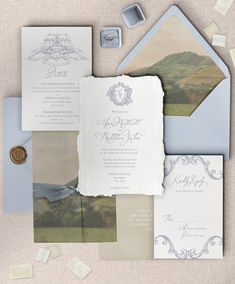 the wedding stationery is laid out and ready to be used as an additional piece of paper