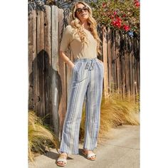 Look fabulous and feel comfortable in our Women's High-Rise Linen-Blend Wide Leg Pant! The breathable linen-blend will move with you wherever you go, and the elastic drawstring waistband provides a perfect fit for all-day wear. Detailed with a frayed hem and four pockets, this versatile pant can take you to the beach or brunch with ease! Product Details - High Rise - Elastic Drawstring Waistband - 4-Pocket Construction - Wide Leg Measurement (Based on size M) - Inseam: 30 - Rise (To top edge of Womens Wide Leg Pants, How To Hem Pants, Wide Leg Linen Pants, Women Lifestyle, Wide Leg Pant, Women Denim Jeans, Women Pants Casual, Drawstring Waistband, Sweater Sleeves