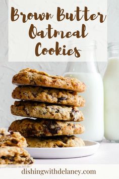 chocolate chip cookies stacked on top of each other next to a glass of milk