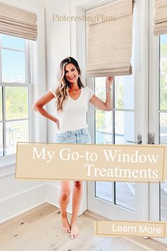 a woman standing in front of a window with the words, my go - to window treatments