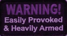 the warning sign is purple and black with white writing on it that says,'warning easily provided & heavily armed '