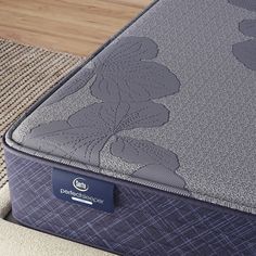 a close up view of a mattress on the floor