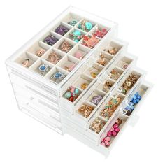 two plastic drawers filled with lots of jewelry