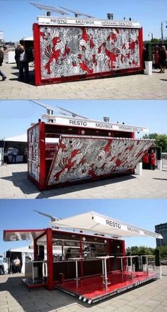 the food cart is painted red and white with dragon designs on it's sides