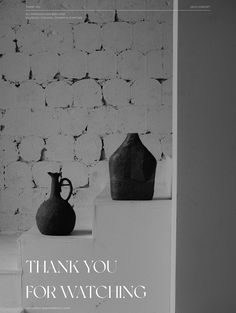 a black and white photo of two vases on some steps with the words thank you for watching