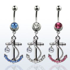 three different colored jeweled anchor belly rings