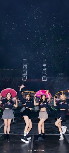 girls'generation performing on stage with umbrellas