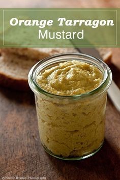 an orange tarragn mustard in a glass jar