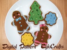 a white plate topped with different shaped cookies