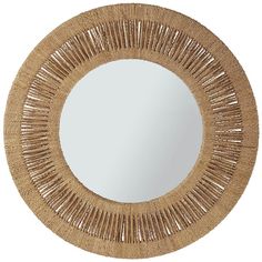 a round mirror made out of straw with measurements for the frame and top half of it