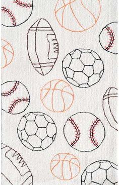 a white towel with different types of balls on it