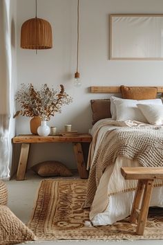 a bed sitting in a bedroom next to a wooden table