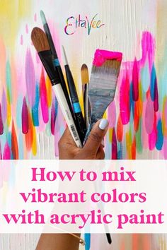 someone holding paintbrushes with the words how to mix vibrant colors with acrylic paint