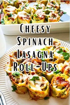 cheesy spinach lasagna roll - ups on a plate