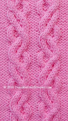 a pink knitted sweater with an intricate design