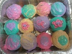 there are many cupcakes that have been decorated with icing