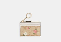 Mini Skinny Id Case In Signature Canvas With Floral Print | COACH OUTLET Coach Floral Wallet, Sling Bag Mini, Mothers Day Poster, Coach Floral, Cute Wallets, Girly Bags, Popular Bags, Keychain Wallet, Black Leather Backpack