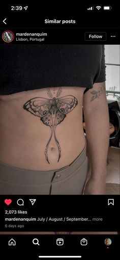 a woman's stomach with a butterfly tattoo on her lower body and bottom part