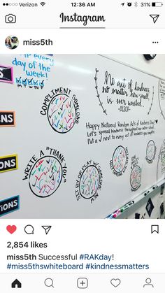 an instagram page with stickers on the back of a whiteboard that says instagram