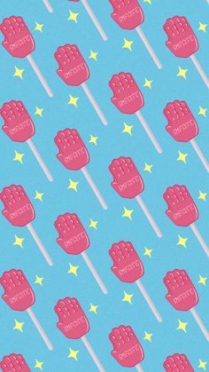 a blue background with pink lollipops and stars